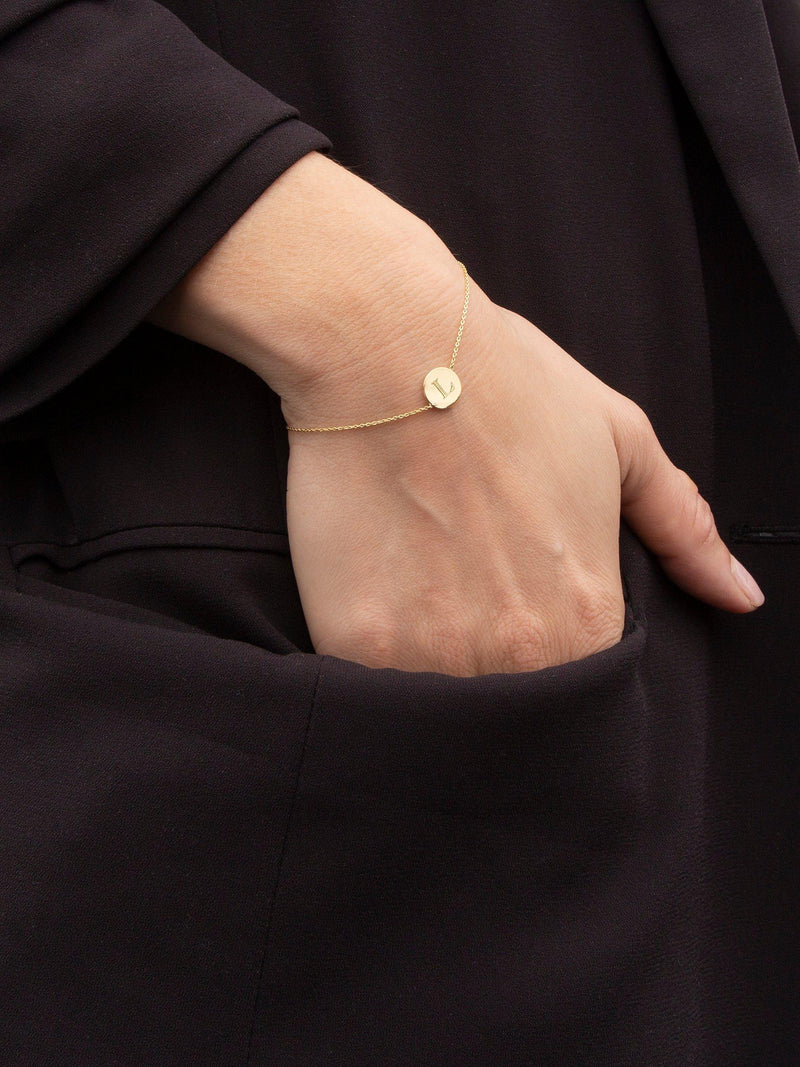 IBB 9ct gold disc initial bracelet, imported from the UK