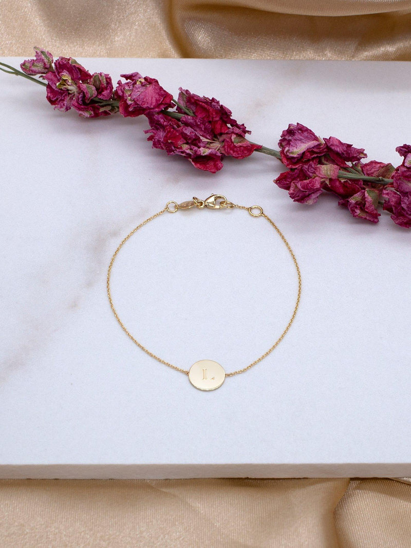 IBB 9ct gold disc initial bracelet, imported from the UK