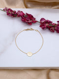 IBB 9ct gold disc initial bracelet, imported from the UK