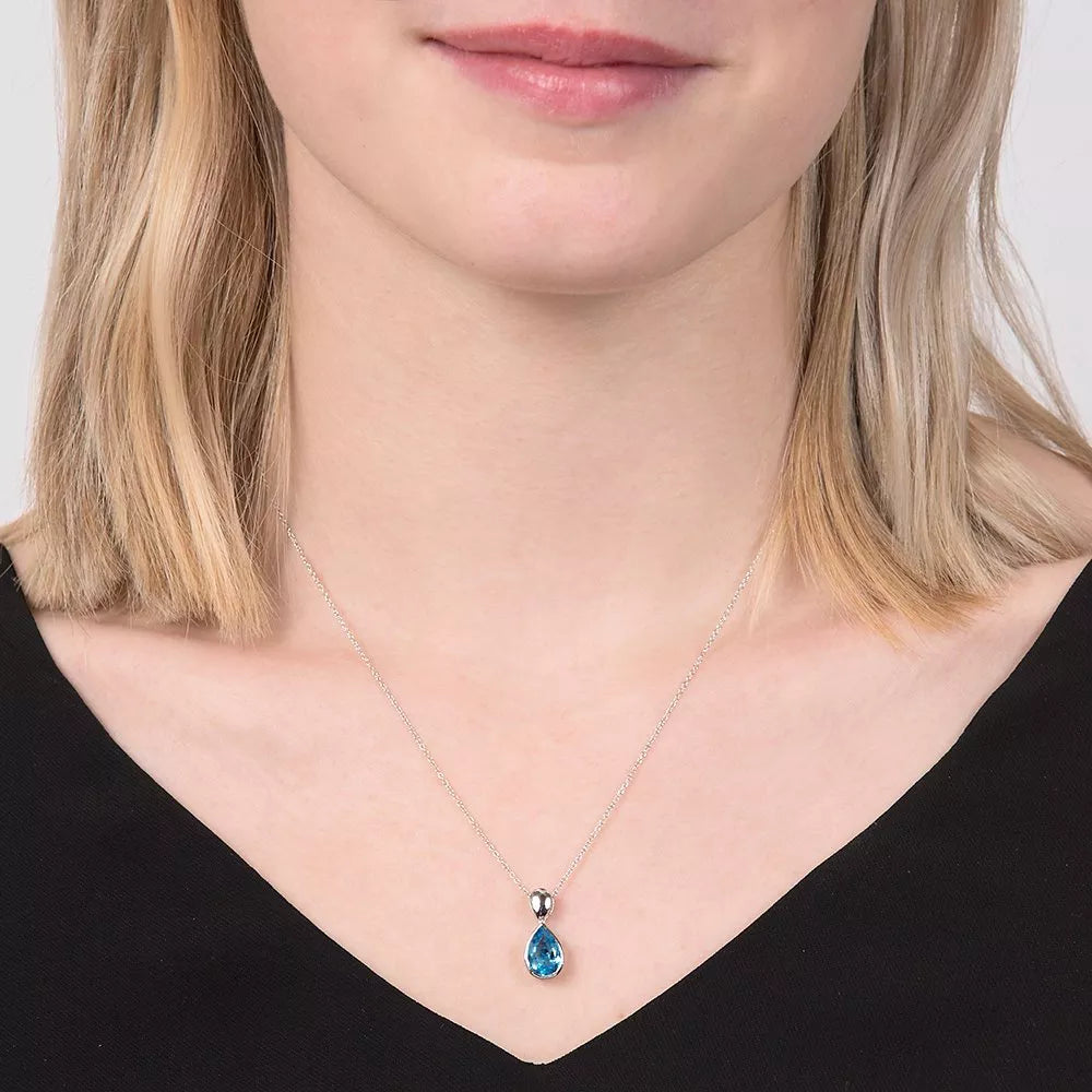 E.W Adams blue topaz pendant 9ct white gold imported from the UK