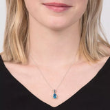E.W Adams blue topaz pendant 9ct white gold imported from the UK