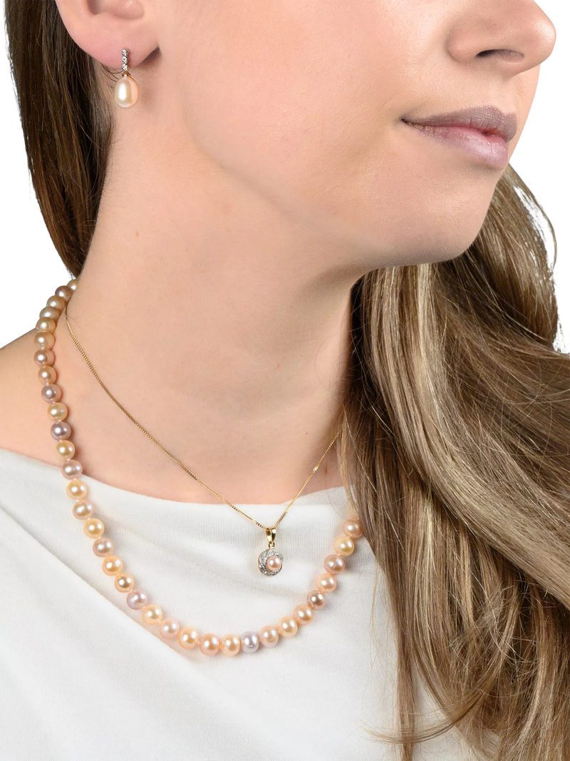 E.W Adams 9ct gold diamond pearl flower pendant, imported from the UK