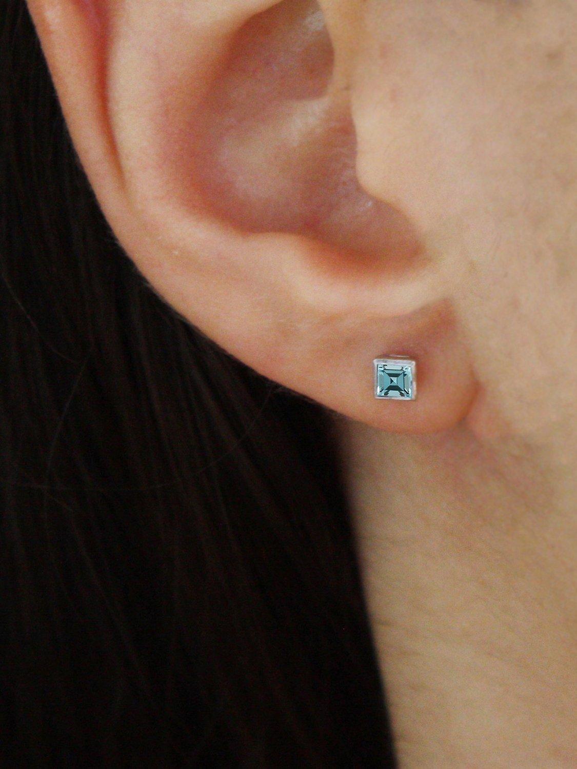 E.W Adams 9ct gold princess cut aquamarine stud earrings, UK version