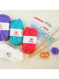 Buttonbag pom pom scarf suitcase knitting kit, UK version