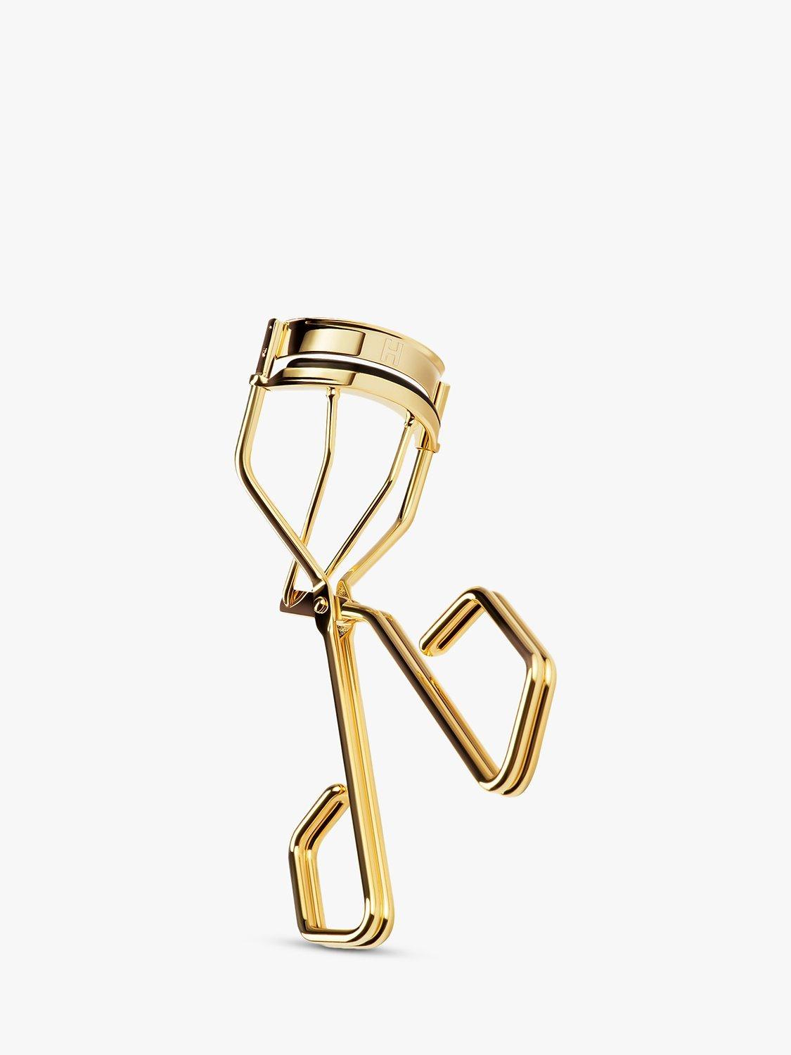 Eyelash curler with ergonomic design and silicone pad, UK version