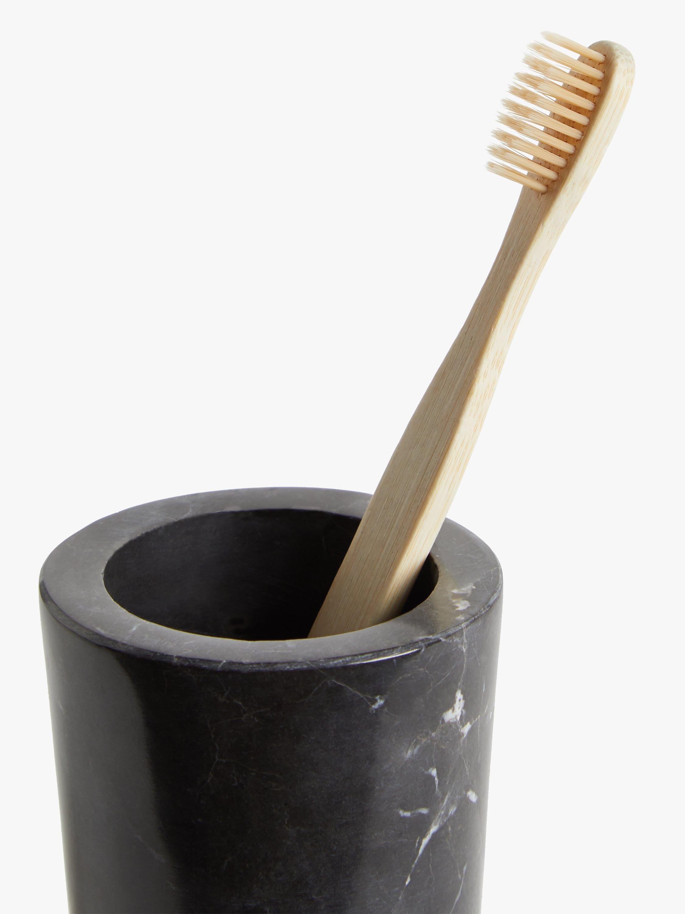 Black marble bathroom tumbler with fine grain and white veins, UK version