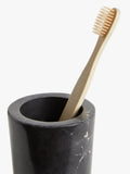 Black marble bathroom tumbler with fine grain and white veins, UK version