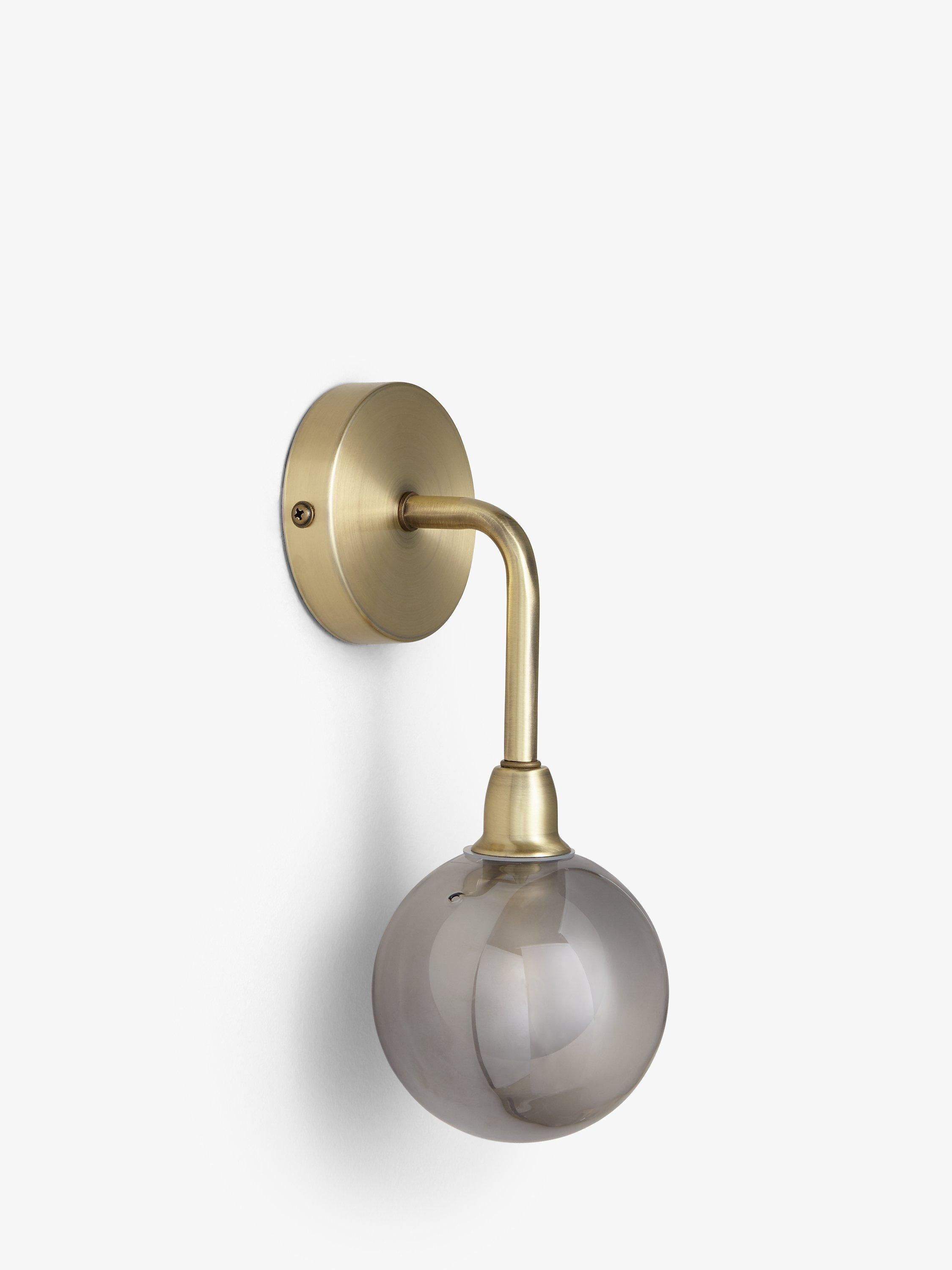 John Lewis Huxley wall light in antique brass with smoked glass shade, UK version