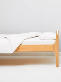 The Little Green Sheep organic wool cotbed pillow, UK version