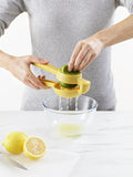 Joseph Joseph citrus press in bright yellow for juicing lemons and limes, UK version
