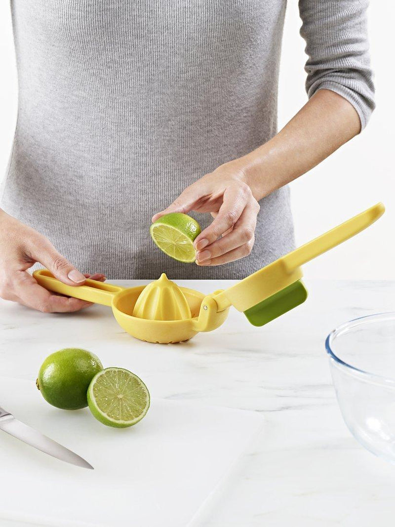 Joseph Joseph citrus press in bright yellow for juicing lemons and limes, UK version