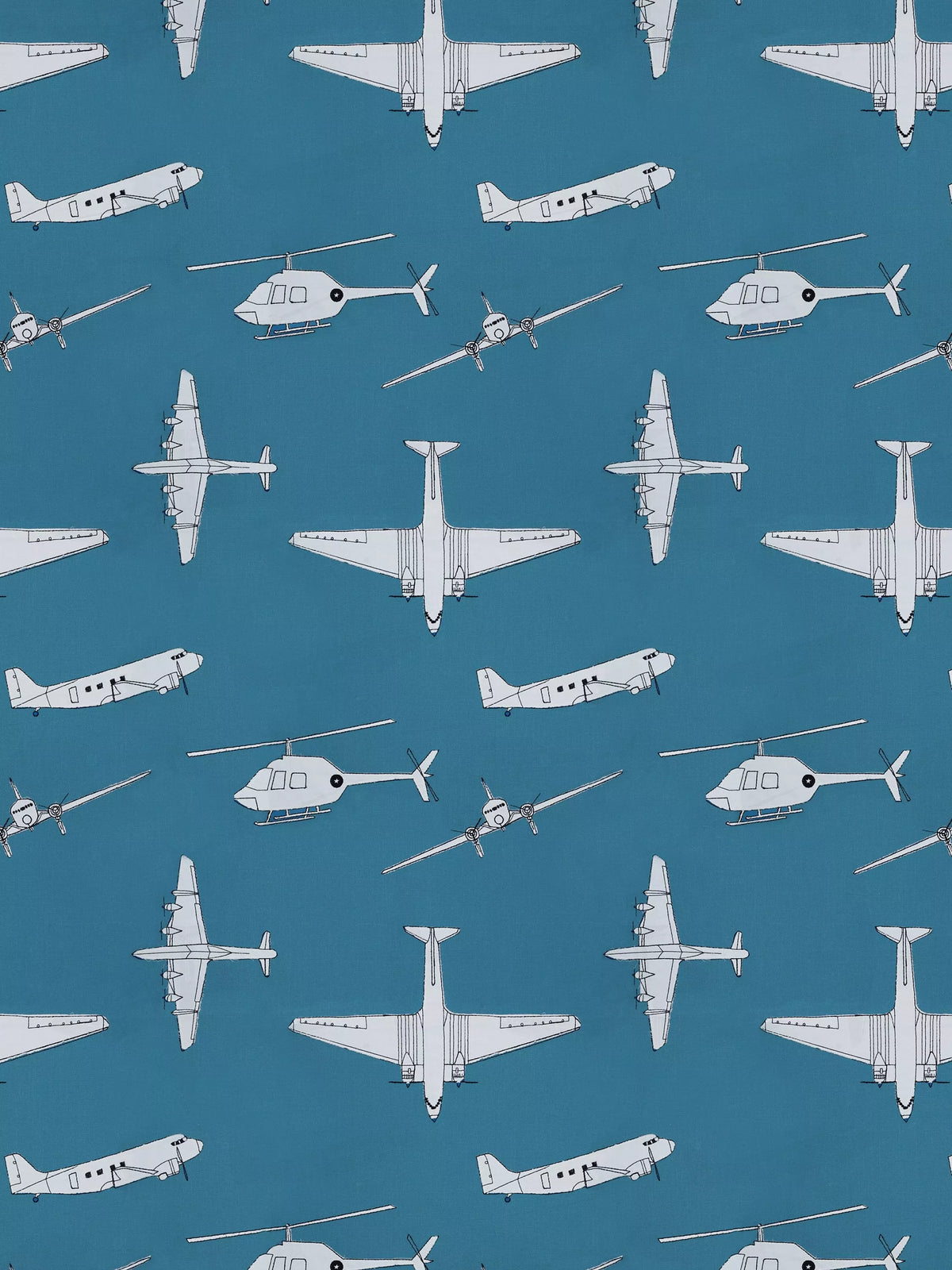 Harlequin Chocks Away fabric with aircraft pattern, imported from the UK