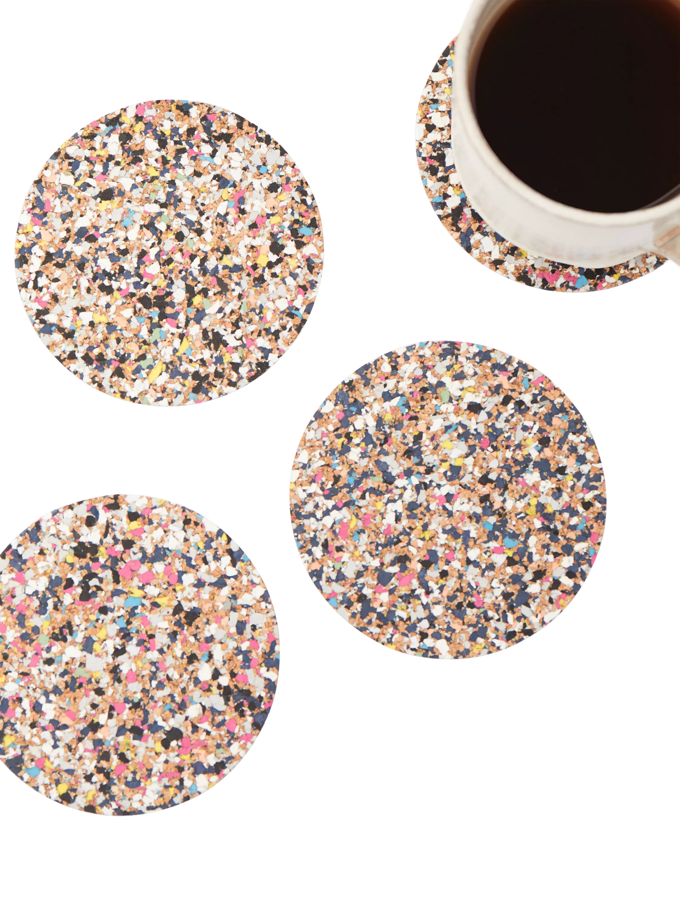 Set of four round cork coasters with recycled plastics by LIGA, UK version