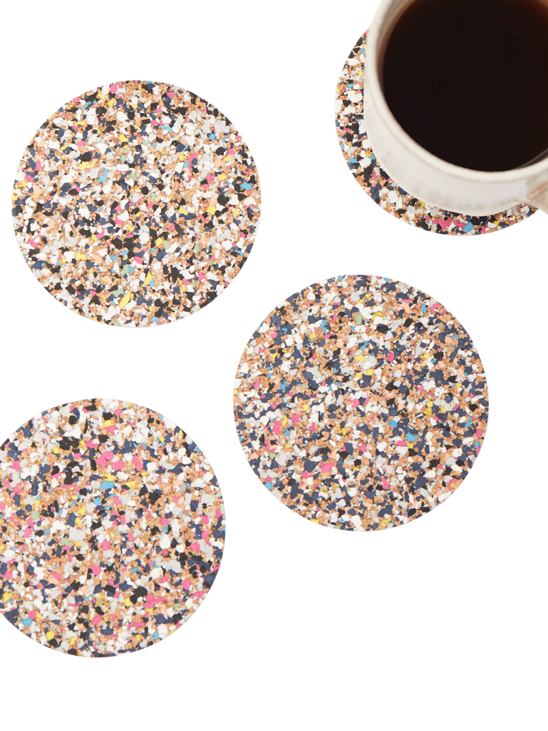 Set of four round cork coasters with recycled plastics by LIGA, UK version
