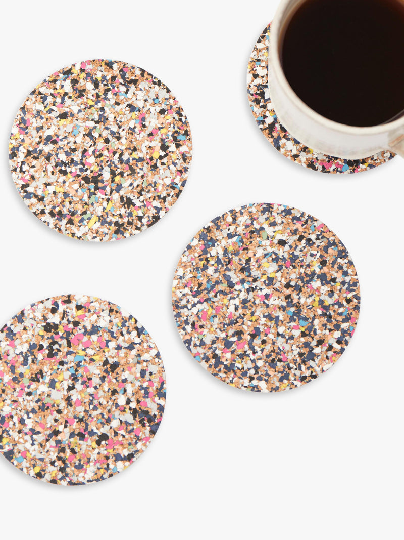 Set of four round cork coasters with recycled plastics by LIGA, UK version