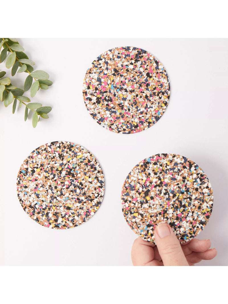 Set of four round cork coasters with recycled plastics by LIGA, UK version