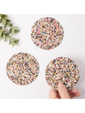Set of four round cork coasters with recycled plastics by LIGA, UK version