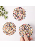 Set of four round cork coasters with recycled plastics by LIGA, UK version