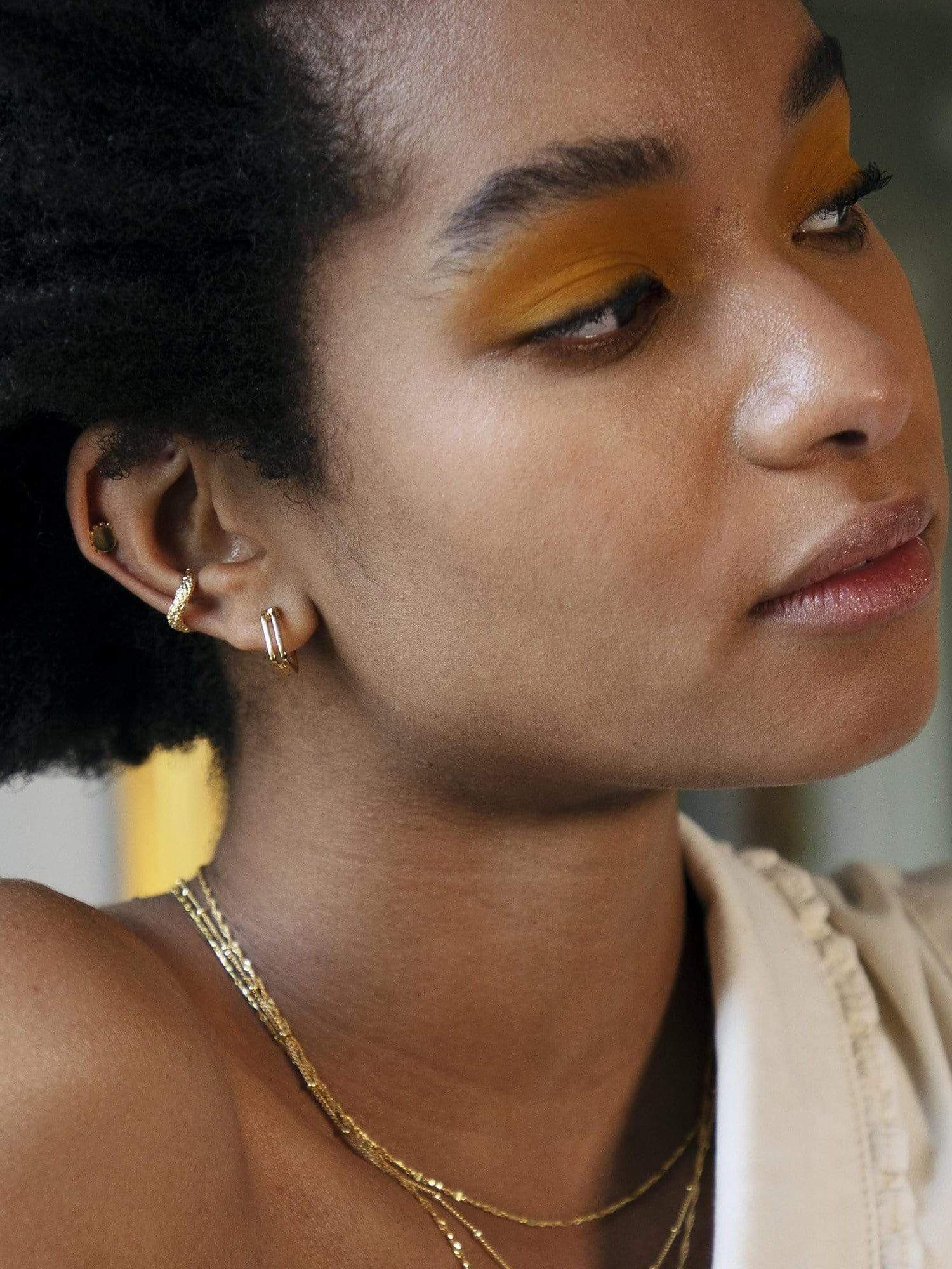 Daisy London Rupi huggie hoop earrings in gold plated vermeil - British product