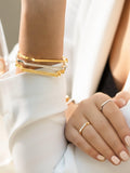 Monica Vinader skinny diamond bangle in gold (British brand)
