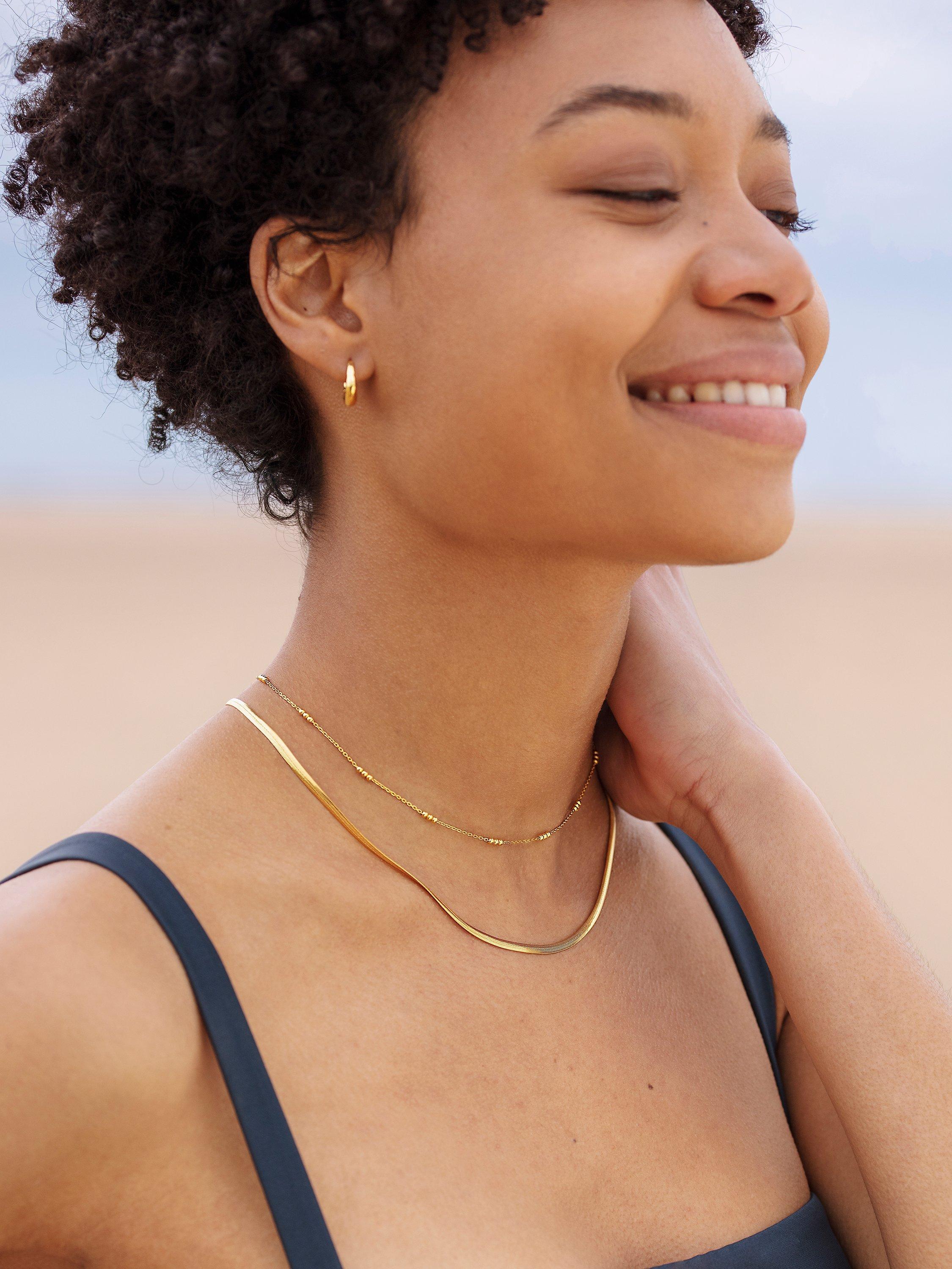 Monica Vinader gold snake chain necklace, imported from the UK