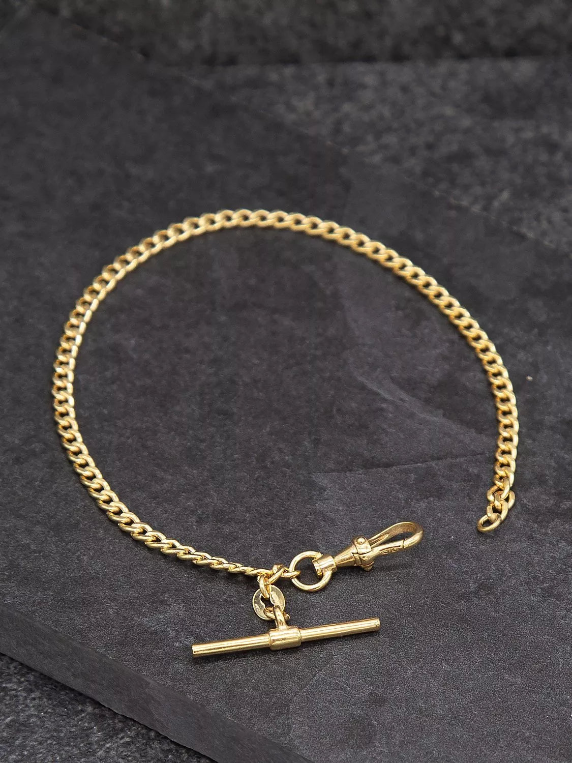 IBB 9ct gold hollow T-bar curb chain bracelet 19cm, UK version