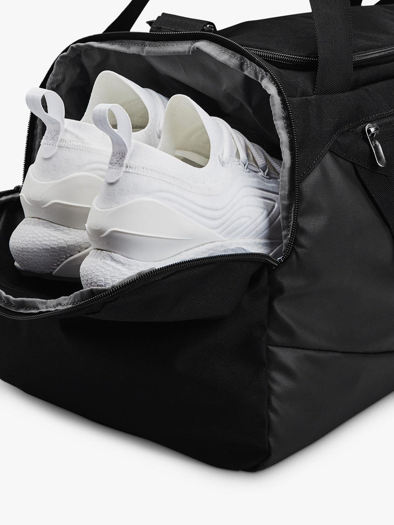 Under Armour medium duffel bag with water-resistant finish and multiple pockets (British brand)