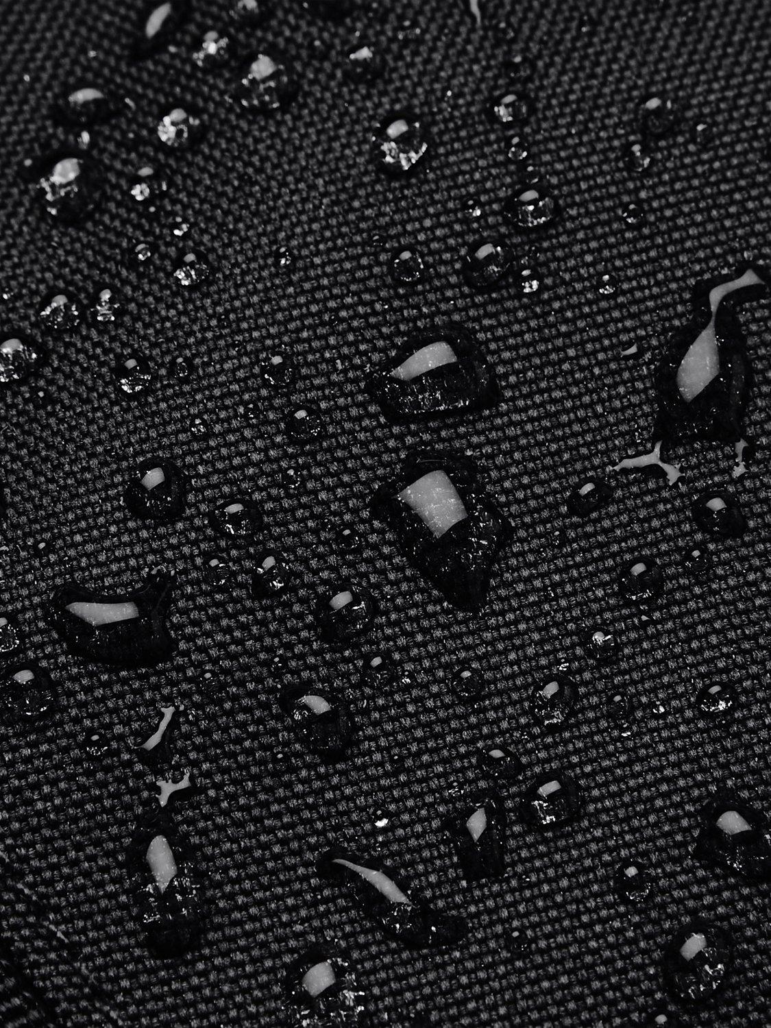 Under Armour medium duffel bag with water-resistant finish and multiple pockets (British brand)