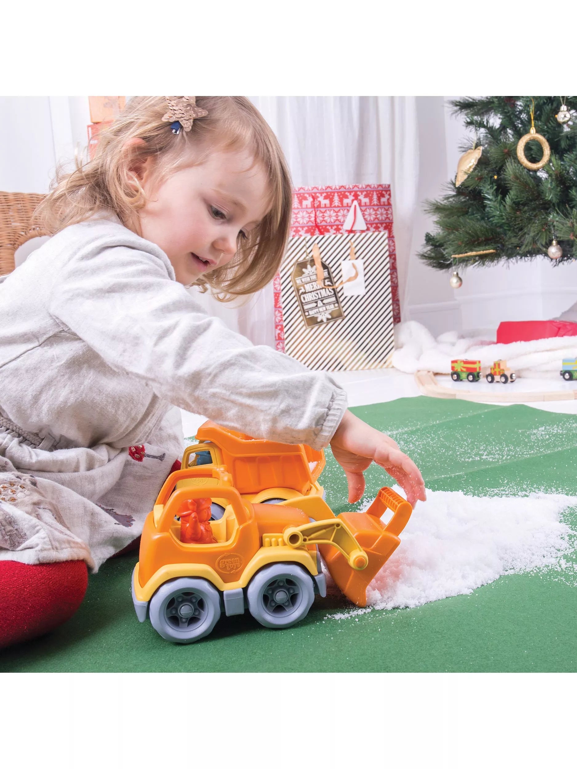 Green Toys scooper truck with bulldog figure, UK version
