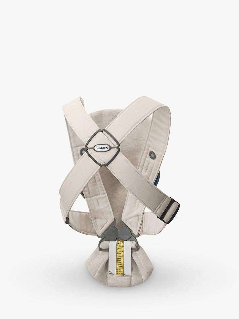 BabyBjörn baby mini carrier in light beige for newborns to 1 year - British product