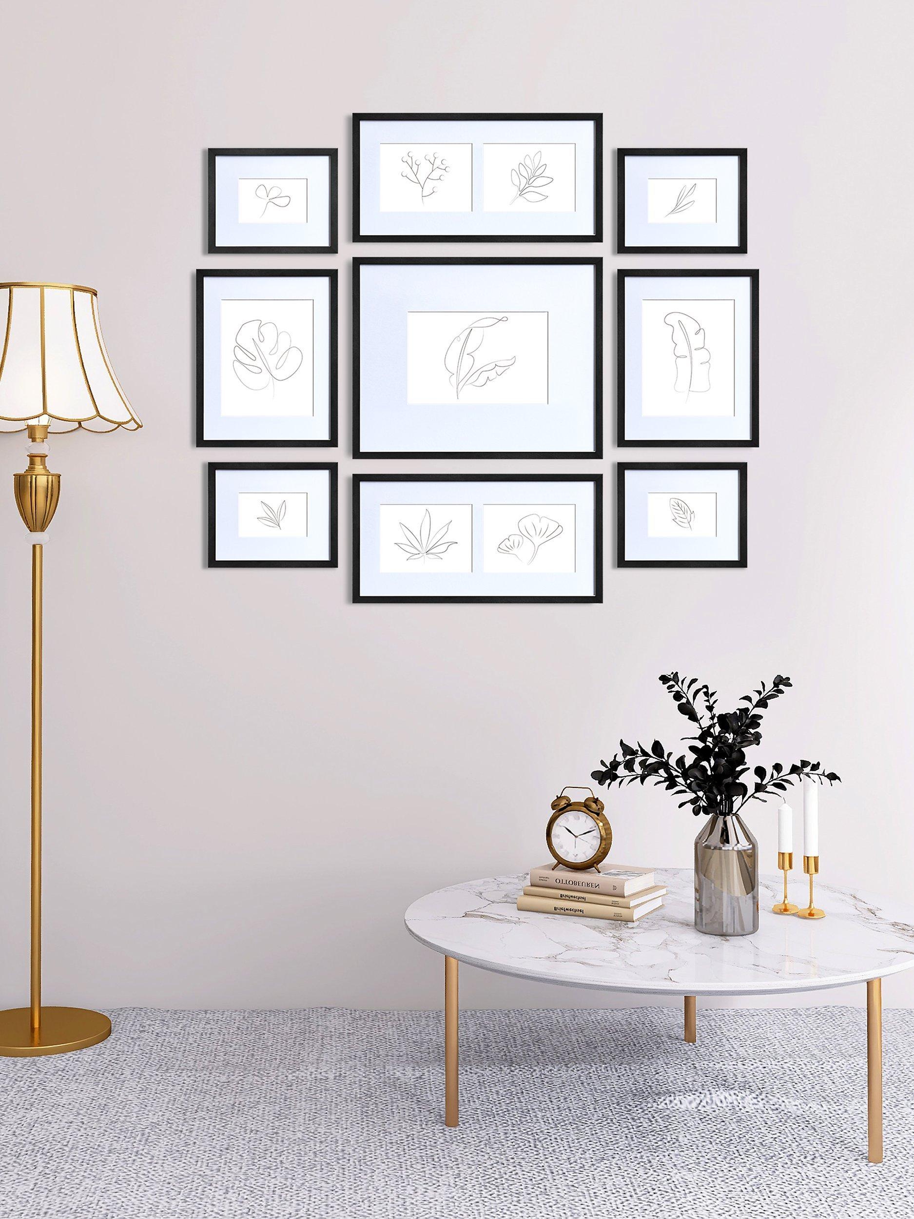 Nielsen multi-aperture photo frame set for 11 photos in black, imported from the UK