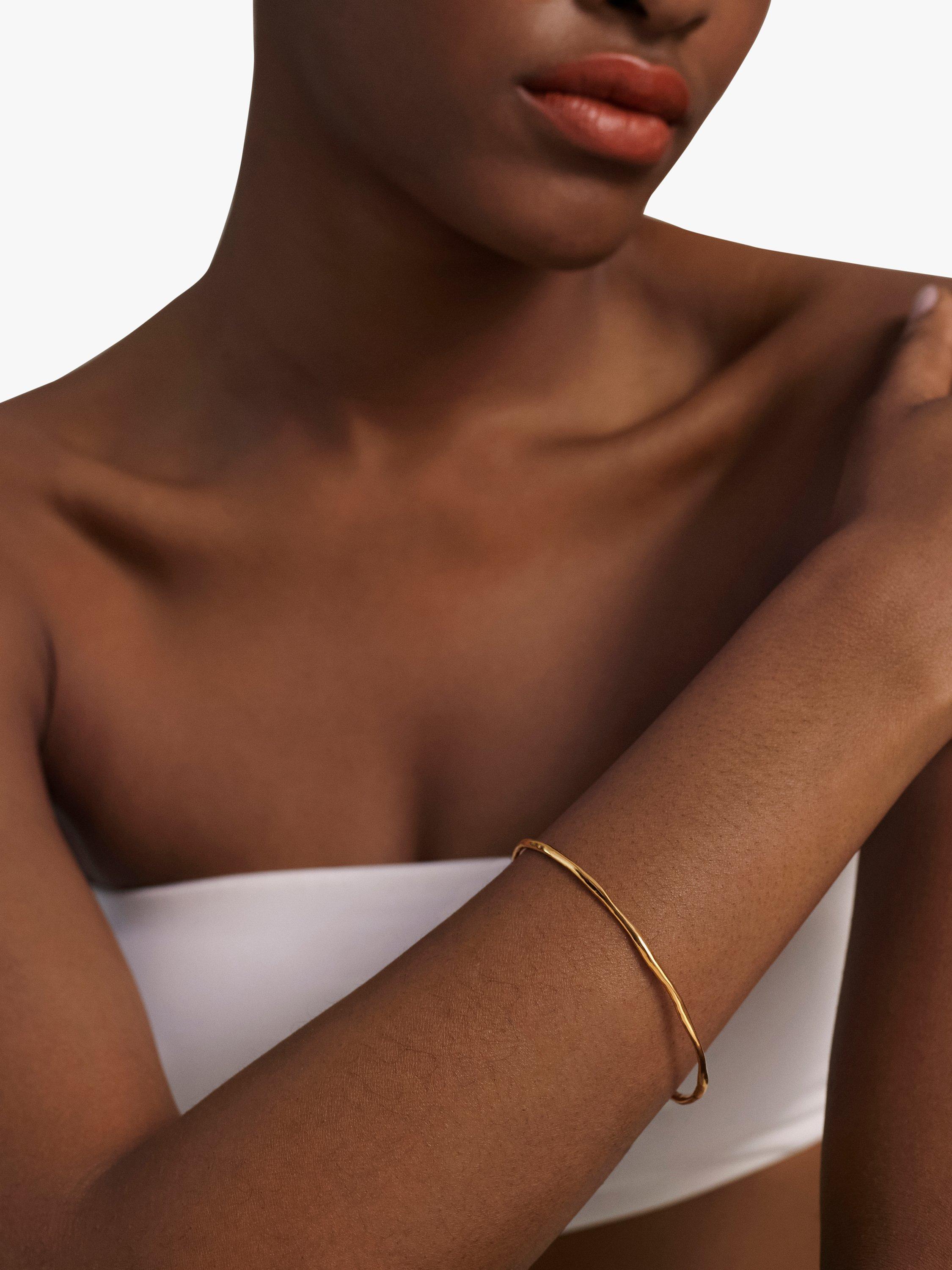 Monica Vinader gold bangle with hammered surface - British product