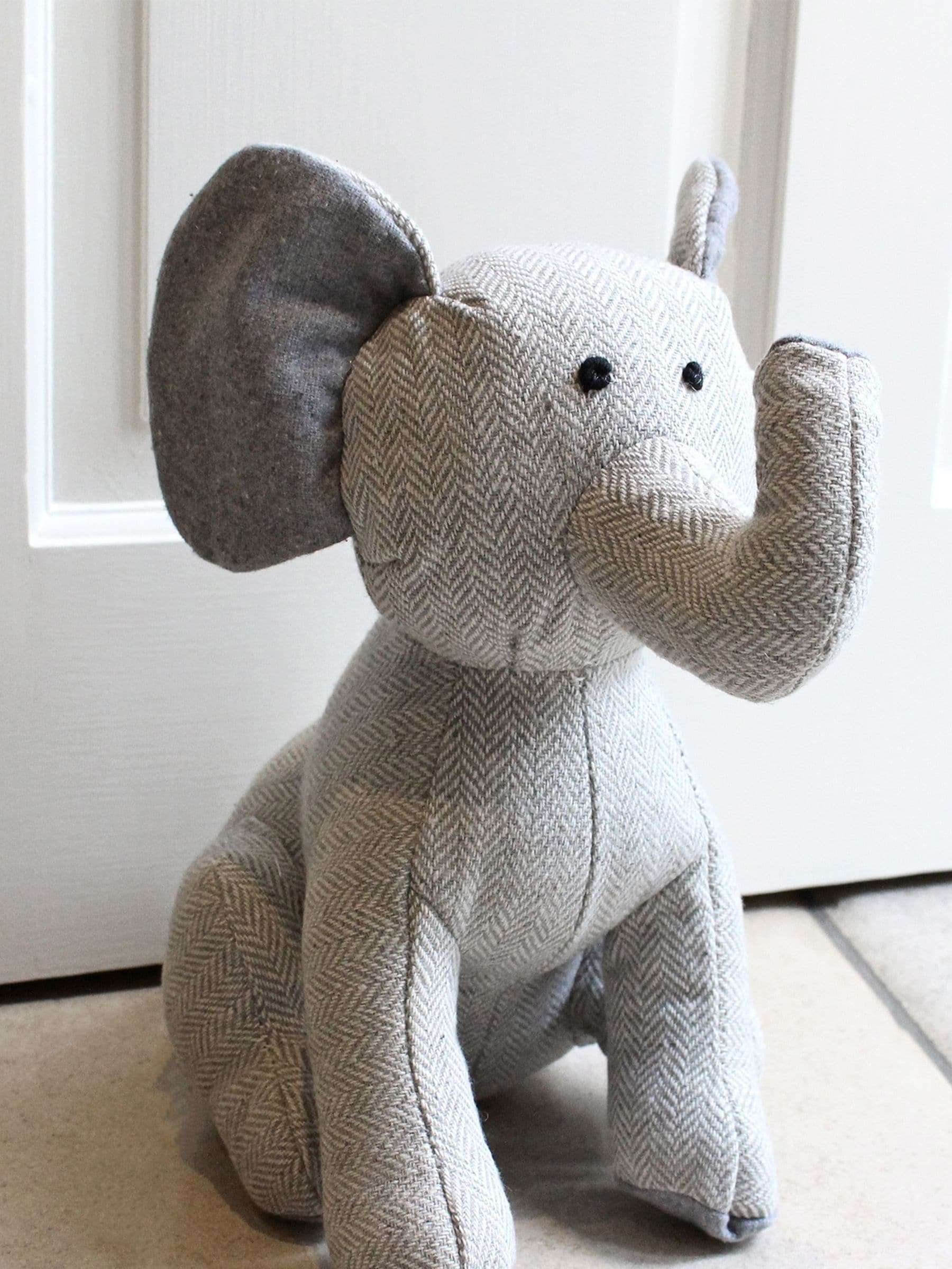 Riva Home elephant doorstop in grey herringbone, UK version