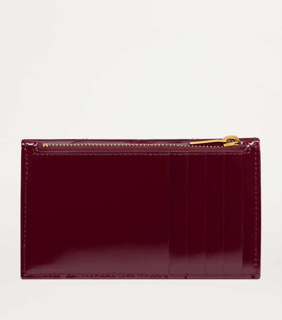 Saint Laurent Cassandre Fragments matelassé purse, UK version