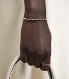 Suzanne Kalan yellow gold bangle with rainbow sapphires and diamonds, UK version