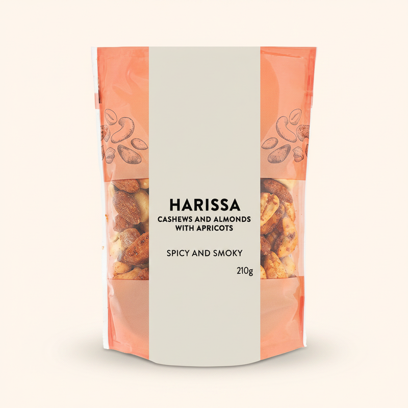 Holland & Barrett Harissa Spiced Cashew and Almond Mix with Apricots 210g, imported from the UK