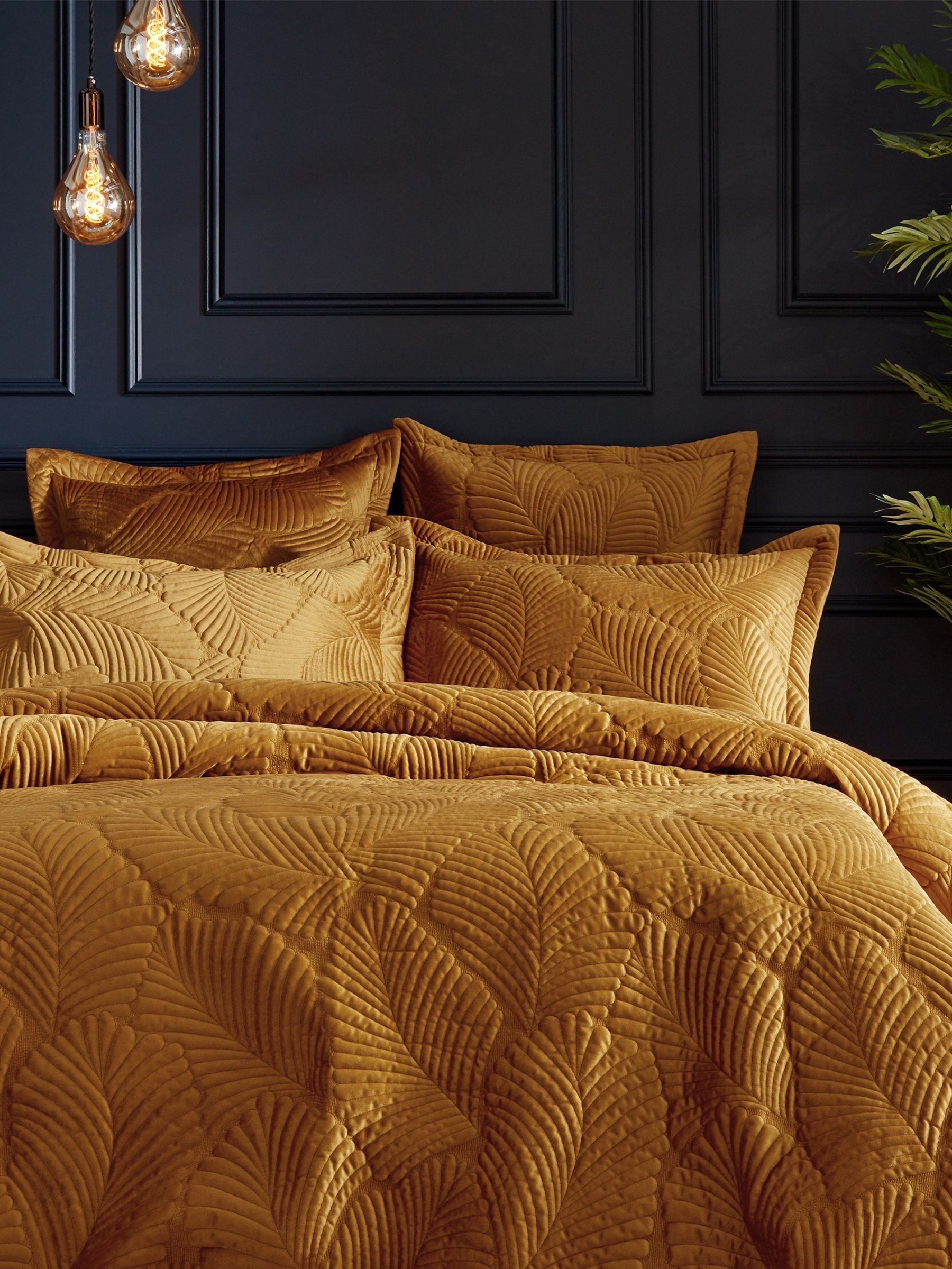 Paoletti gold quilted velvet duvet cover and pillowcase set, imported from the UK
