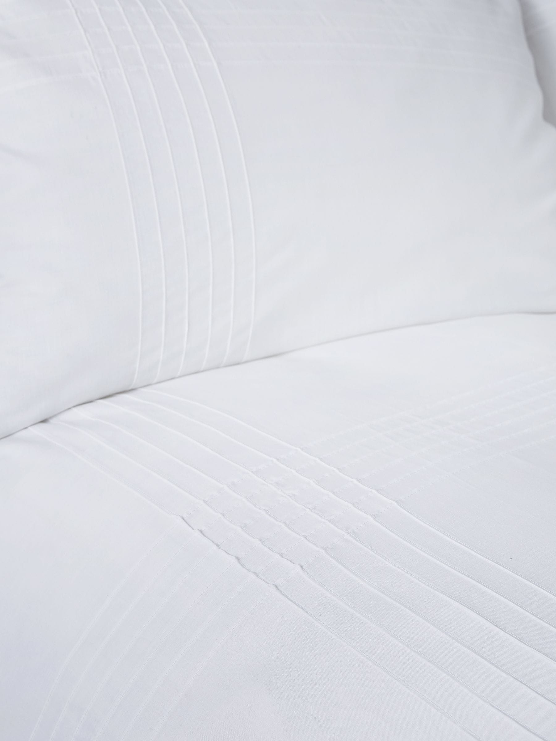 Serene white Amalfi pin tuck duvet cover and pillowcase set (British brand)