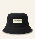 Prada shearling bucket hat with iconic Triangle logo, imported from the UK