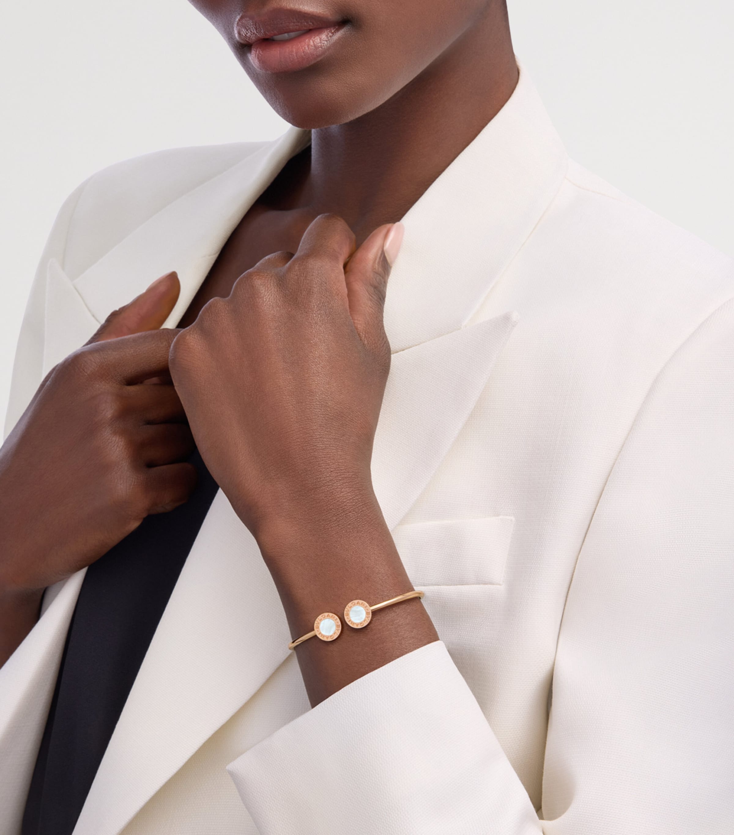 Bvlgari rose gold bangle with mother-of-pearl, imported from the UK