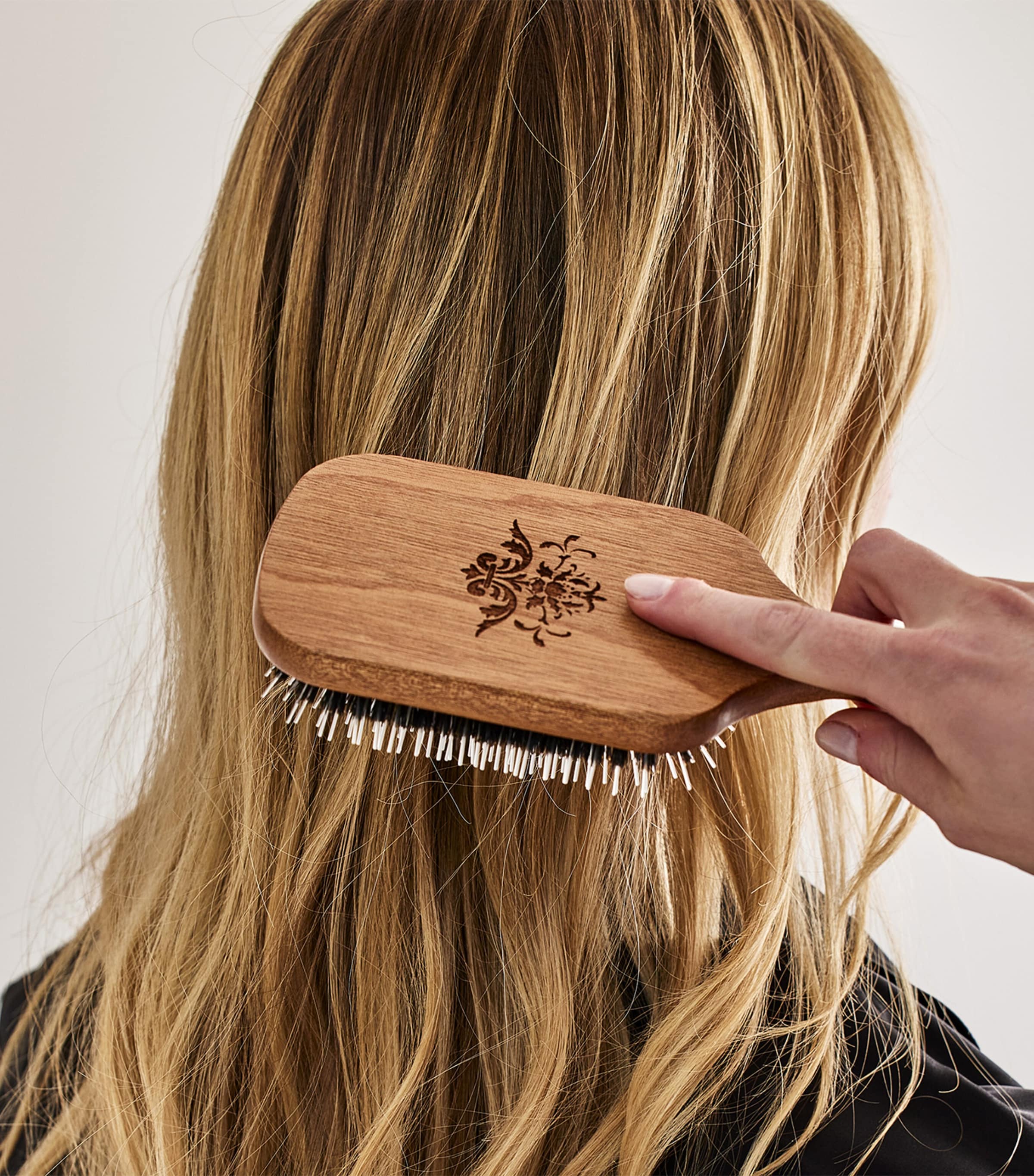 Philip B mahogany paddle hairbrush with natural boar and nylon bristles, imported from the UK