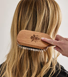 Philip B mahogany paddle hairbrush with natural boar and nylon bristles, imported from the UK