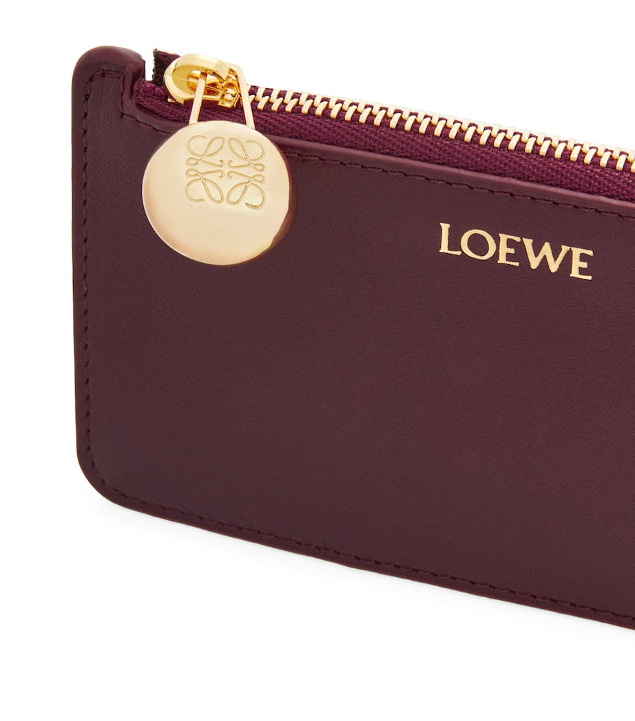 LOEWE leather pebble card holder with gold-tone fastening, UK version