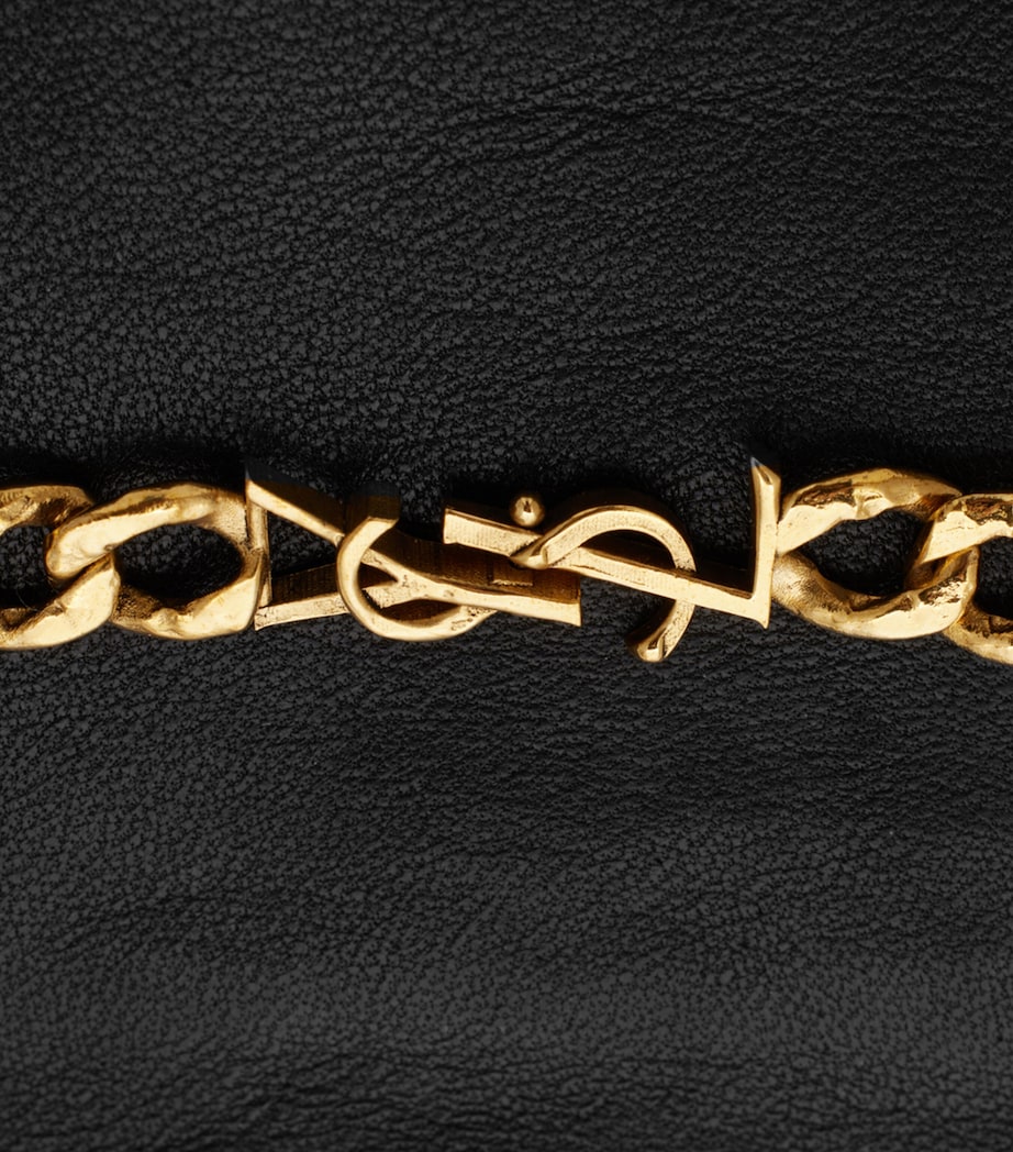 Saint Laurent cashmere-lined leather gloves with chain detail (British brand)