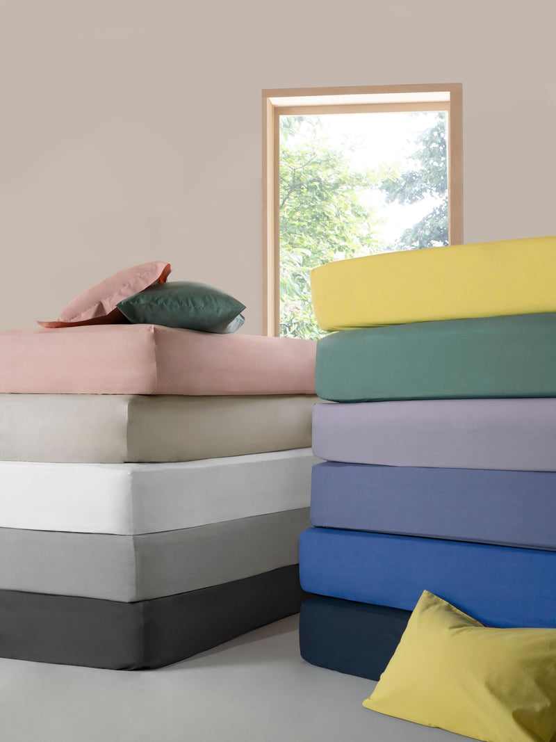 Pink easy-care polycotton fitted sheet, imported from the UK