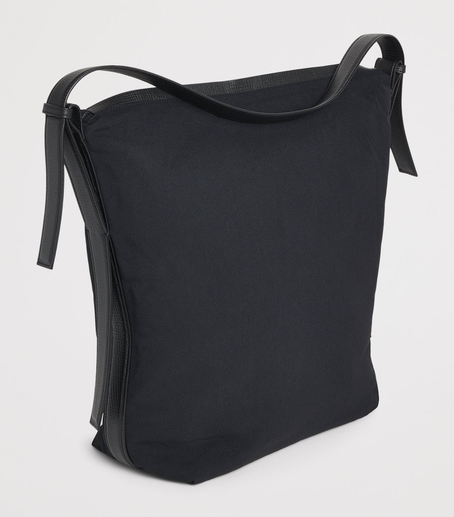 Studio Nicholson large nylon Airport shoulder bag, imported from the UK