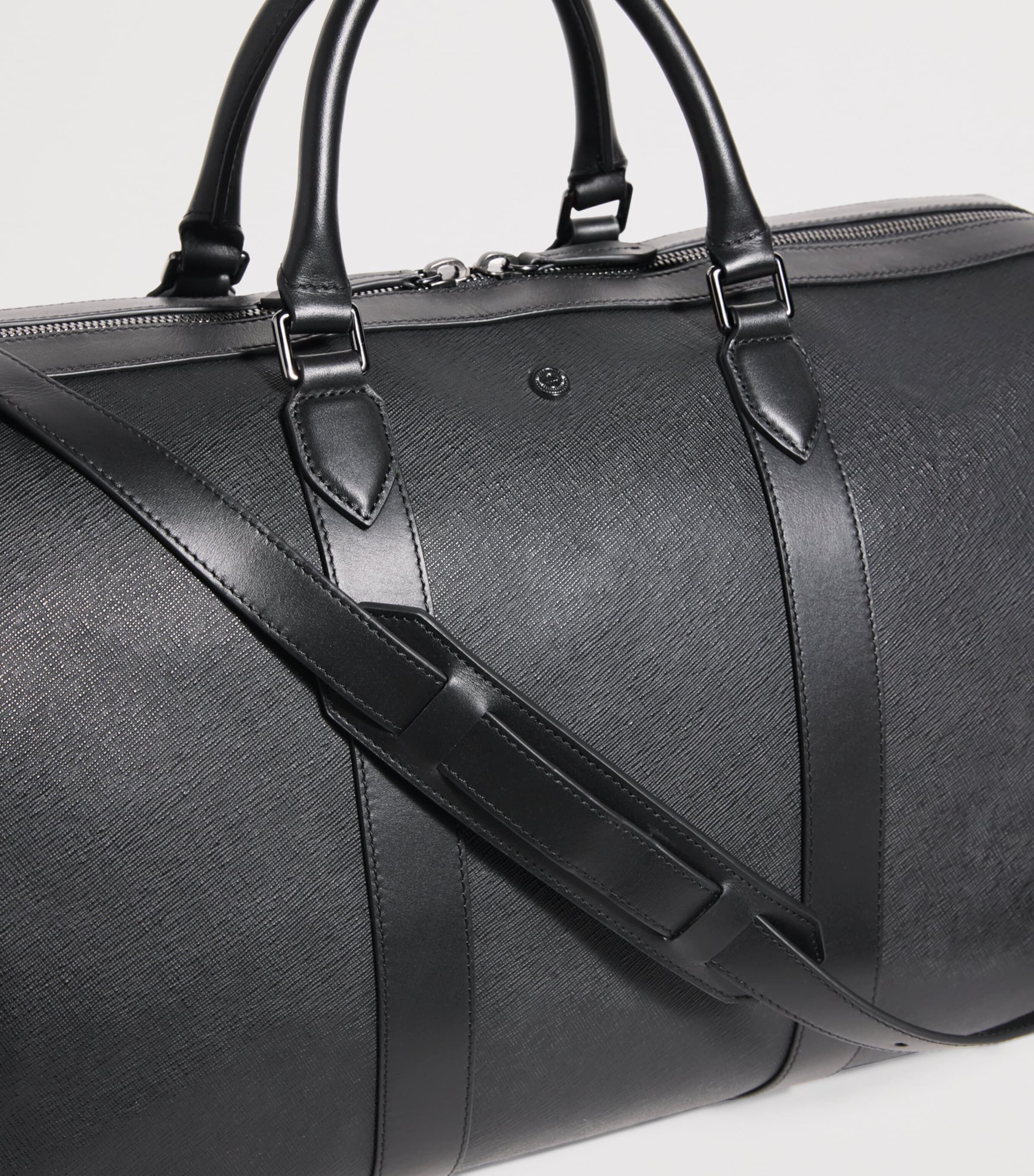 Harrods leather holdall with gunmetal hardware, imported from the UK