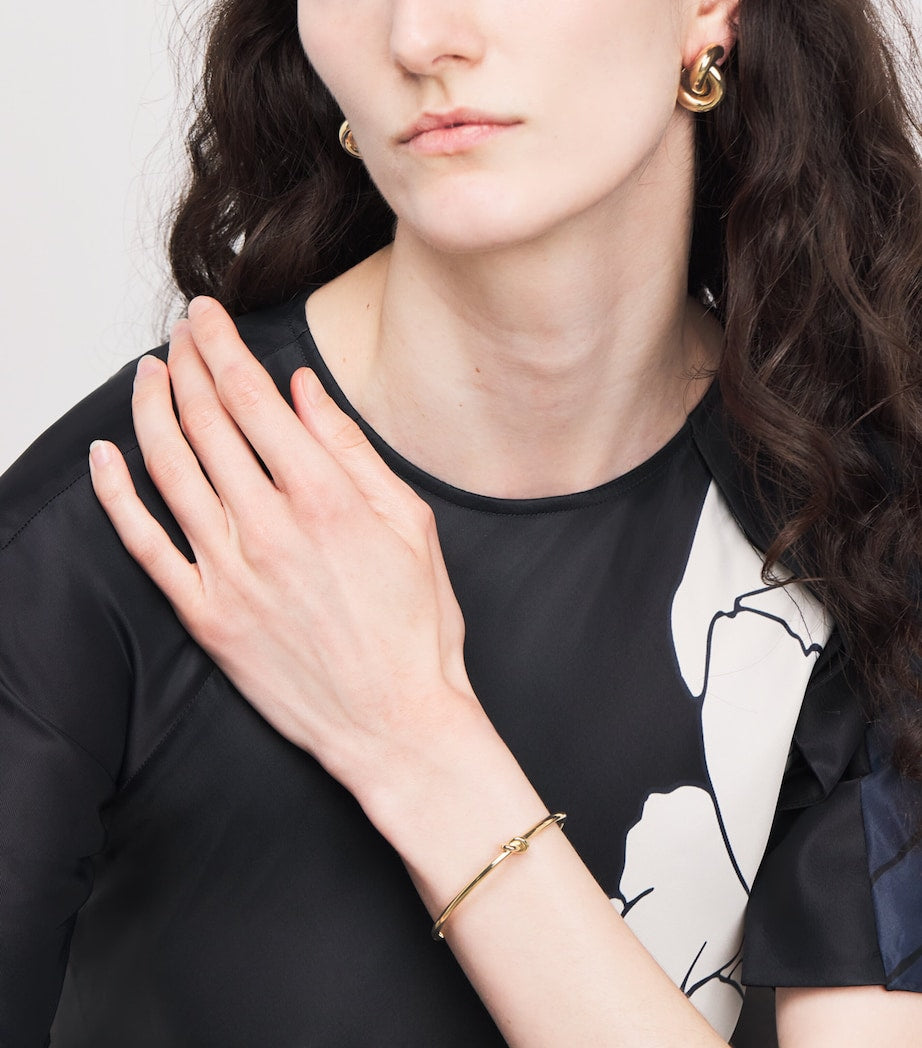 Engelbert yellow gold Legacy Knot bangle (British brand)