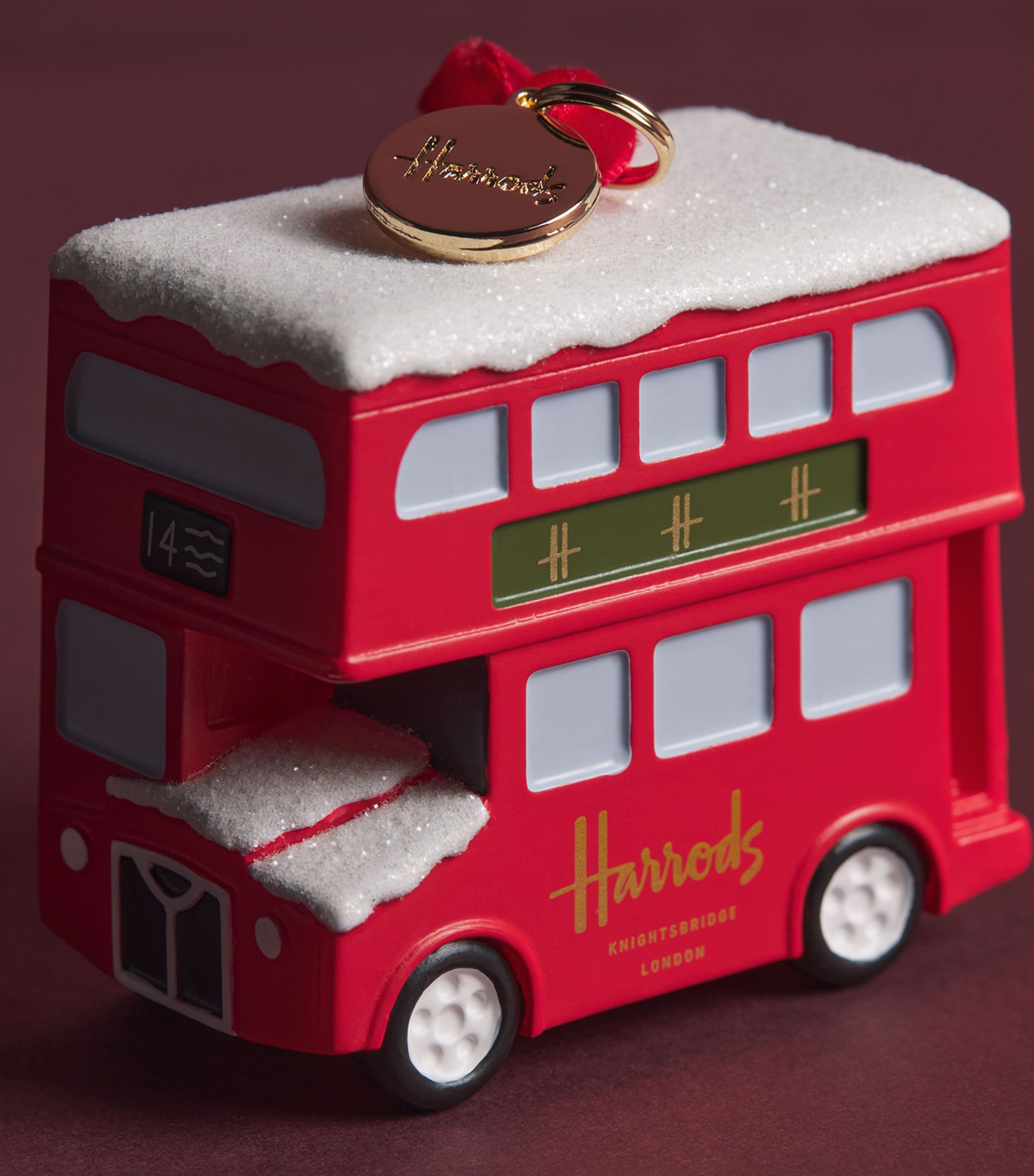 Harrods London bus decoration with iridescent snow, UK version