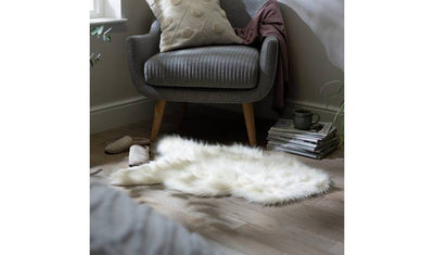 Argos Habitat Sheepskin Faux Fur Cream Shaggy Rug - 60x90cm- Buy online at McGrocer